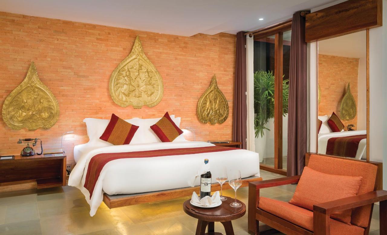 Golden Temple Residence Siem Reap Ngoại thất bức ảnh A bedroom at the hotel